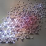 AntiVJ's Joanie Lemercier Maps Light Projections To 3D Origami Walls